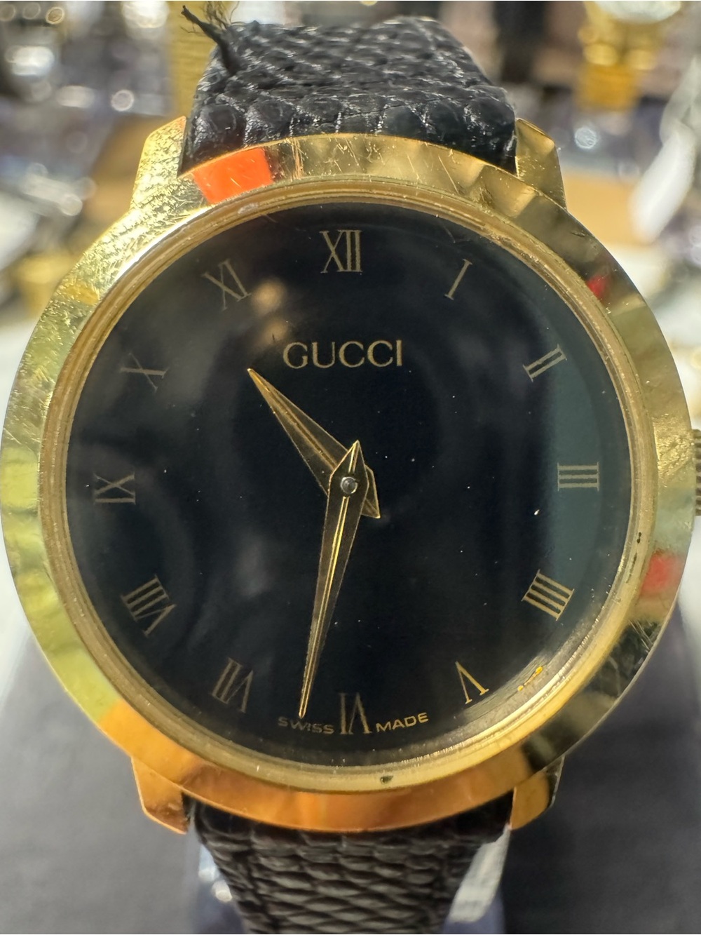 #228 Gucci Black Dial Gold-Tone Case woman’s Watch with Black Leather Strap